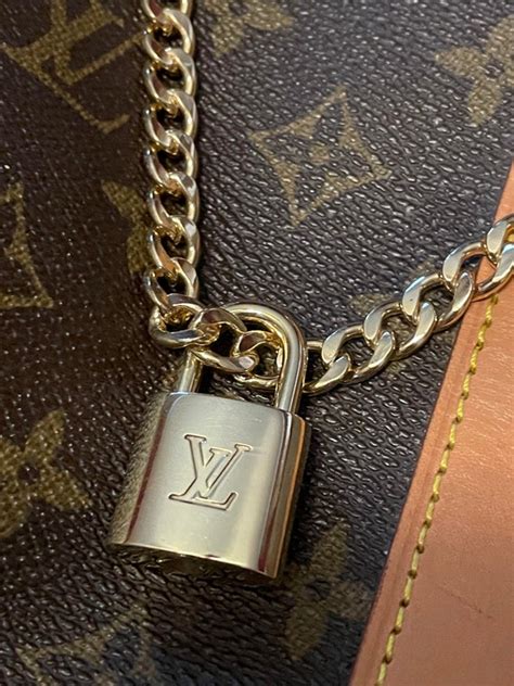 louis vuitton twist lock|authentic louis vuitton lock.